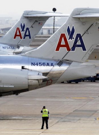 American Airlines announces concessions to unions now that it is in bankruptcy. Here, American Airlines jets are seen at Dallas-Fort Worth International Airport, Wednesday February 1, 2012. (Ron T. Ennis/Fort Worth Star-Telegram/MCT)