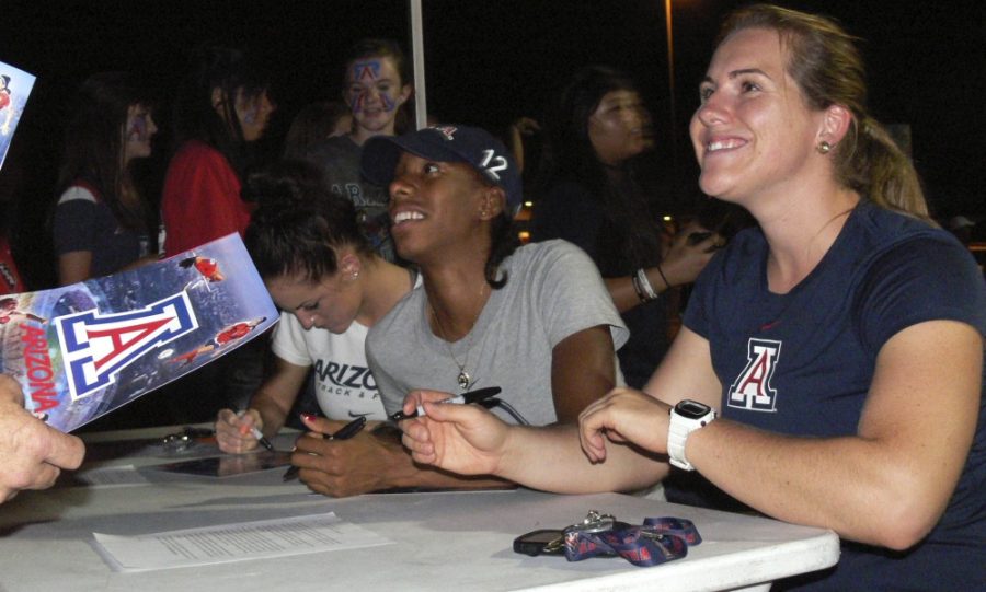Jim ORourke/Arizona Daily Wildcat

During the soccer game against BYU on Thursday, Olympic athletes Georganne Moline (left), Brigetta Barrett and Julie Labonte were honored for competing in London this summer. Barrett won the silver medal for the high jump.