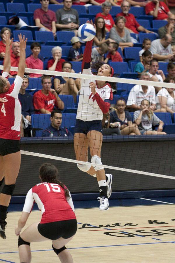 Larry Hogan/Arizona Daily Wildcat

Outside Hitter Taylor Arizobal, No. 14, and the rest of the UA volleyball team plays against Cal State Northridge on Friday, Aug.24.