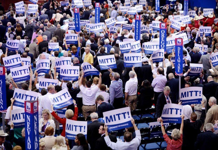 Delegates+and+supporters+sing+and+dance+as+Mitt+Romney+secures+enough+delegates+to+officially+win+the+Republican+presidential+nomination+at+the+Republican+National+Convention+at+the+Tampa+Bay+Times+Forum+in+Tampa%2C+Florida%2C+Tuesday%2C+August+28%2C+2012.+%28Olivier+Douliery%2FAbaca+Press%2FMCT%29+