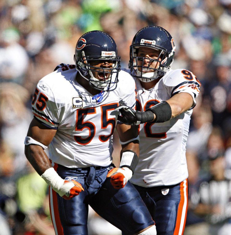 Chicago Bears linebackers Lance Briggs (55) and Hunter Hillenmeyer (92) celebrate after Briggs' sacked Seattle Seahawks quarterback Seneca Wallace in the second quarter of an NFL football gameat Qwest Field in Seattle, Washington, Sunday, September 27, 2009. (Brian Cassella/Chicago Tribune/MCT)