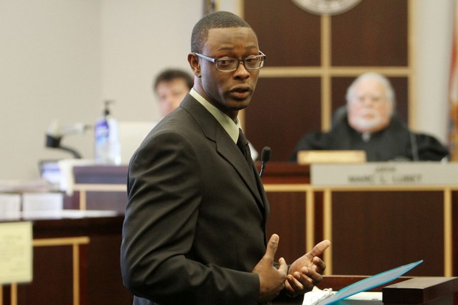 Brian Jones, looks at the parents of Robert Champion, Monday, October 22, 2012, as he apologizes to Champions parents, Pam and Robert Champion Sr. before being sentenced in an Orlando, Florida courtroom in the Florida A&M University hazing incident.  (Red Huber/Orlando Sentinel/MCT)