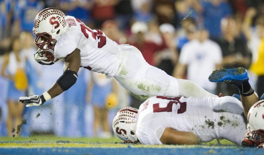 Stanford running back Stepfan Taylor (33) dives into the endzone with a 1-yard touchdown run against UCLA on Saturday, November 24, 2012, at the Rose Bowl in Pasadena, California. Stanford knocked off the host Bruins, 35-17. (Michael Goulding/Orange County Register/MCT)