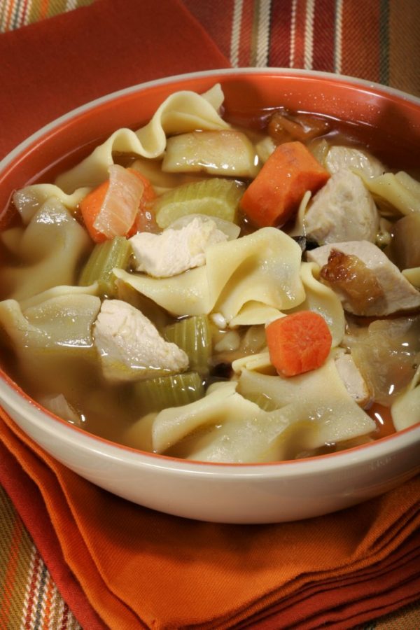 Adding roasted vegetables bumps up the flavor profile and reduces sodium in this chicken noodle soup. (Tammy Ljungblad/Kansas City Star/MCT)
