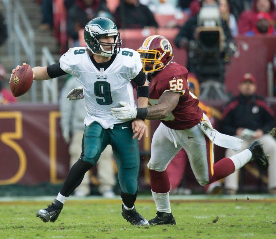 Philadelphia Eagles quarterback Nick Foles (9) is chased and sacked by Washington Redskins inside linebacker Perry Riley (56) during the second half at FedEx Field in Landover, MD, Sunday, November 18, 2012. Washington defeated Philadelphia 31-6. (Harry E. Walker/MCT)  
 
