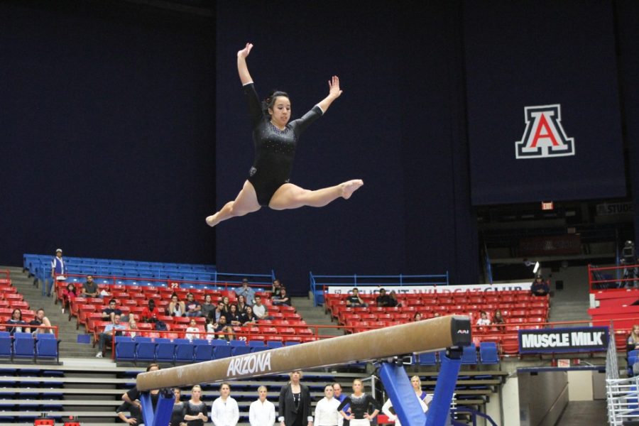 Kelsee+Becker+%2F++Arizona+Daily+Wildcat%0A%0AArizona+Freshman+Shelby+Edwards+performs+during+her+balance+beam+routine+on+Friday+against+The+University+of+Utah.+Although+Arizona+lost+to+Utes+by+0.525%2C+they+posted+a+season+high+of+196.075.