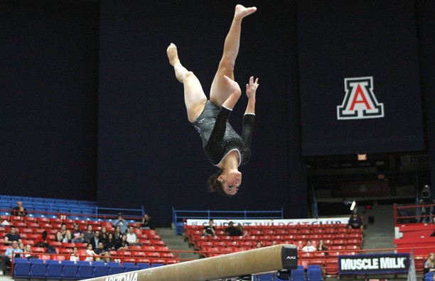 Kelsee Becker /  Arizona Daily Wildcat

Arizona Senior Aubree Cristello performs her balance beam routine on Friday against The University of Utah. Although Arizona lost to Utes by 0.525, they posted a season high of 196.075.