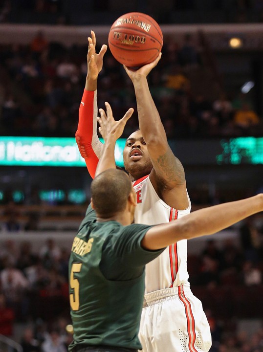 Ohio State's Deshaun Thomas hits a jumper against Michigan State's Adreian Payne (5) during the first half of their Big Ten Tournament semifinal at United Center in Chicago, Illinois, on Saturday, March 16, 2013. (Kyle Robertson/Columbus Dispatch/MCT) 