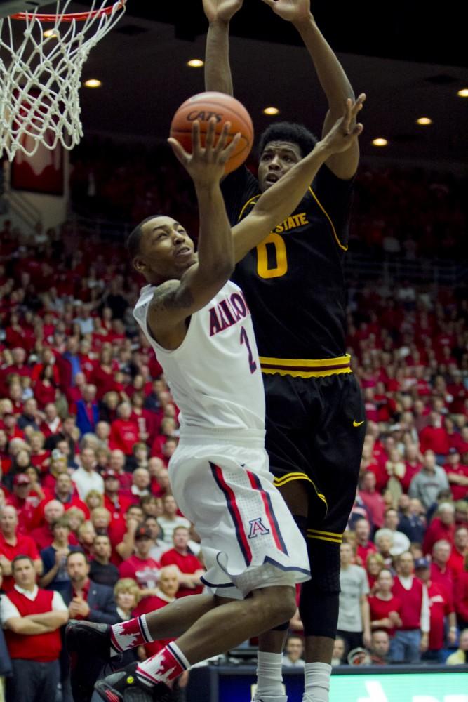 Mark Lyons attempts a layup against ASU on Saturday, March 9, 2013. Arizona won the game 73-58 at McKale Center.