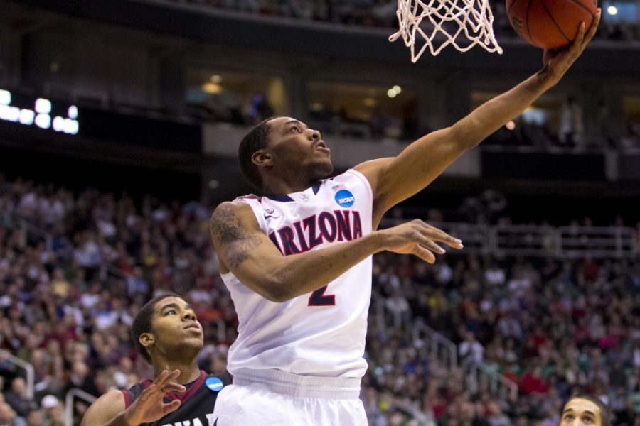 	Arizona point guard Mark Lyons attempts a layup against Harvard in the third round of the NCAA Tournament on March 23, 2013 in Salt Lake City. Lyons scored a career-high 27 points as the Wildcats advanced to the Sweet 16 for the third time in six years. 