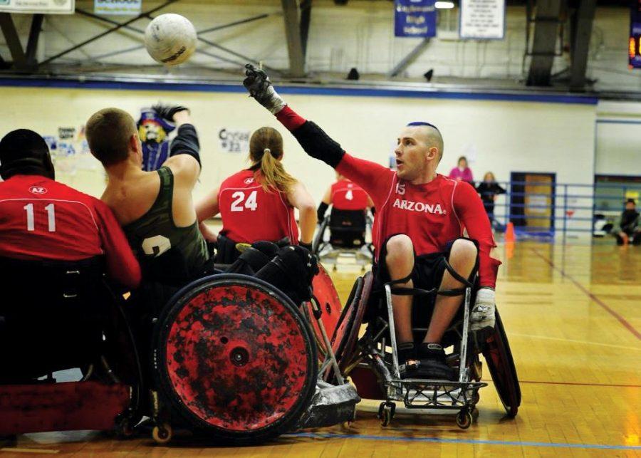 	Photo courtesy of Chelsea falnes 

	Josh O’Neill, a member of the UA Quad rugby team, attempts to grab the ball in order to carry it between a pair of cones to score a point. The quad rugby team will play for a national title this weekend in Louisville, Ky.