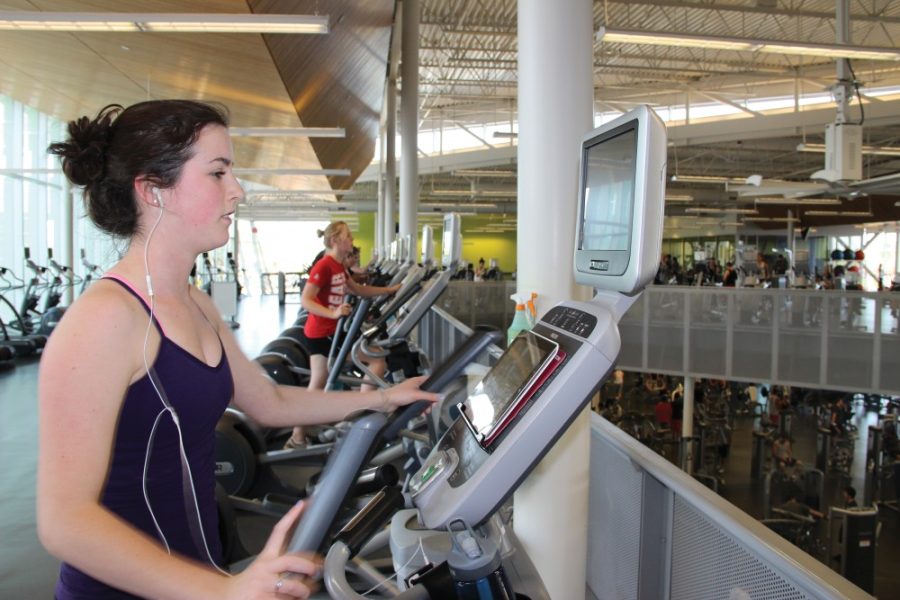 	Mark armao/arizona Daily Wildcat 

	Maggie Bliss, an environmental sciences freshman, works out at the Student Recreation Center. 