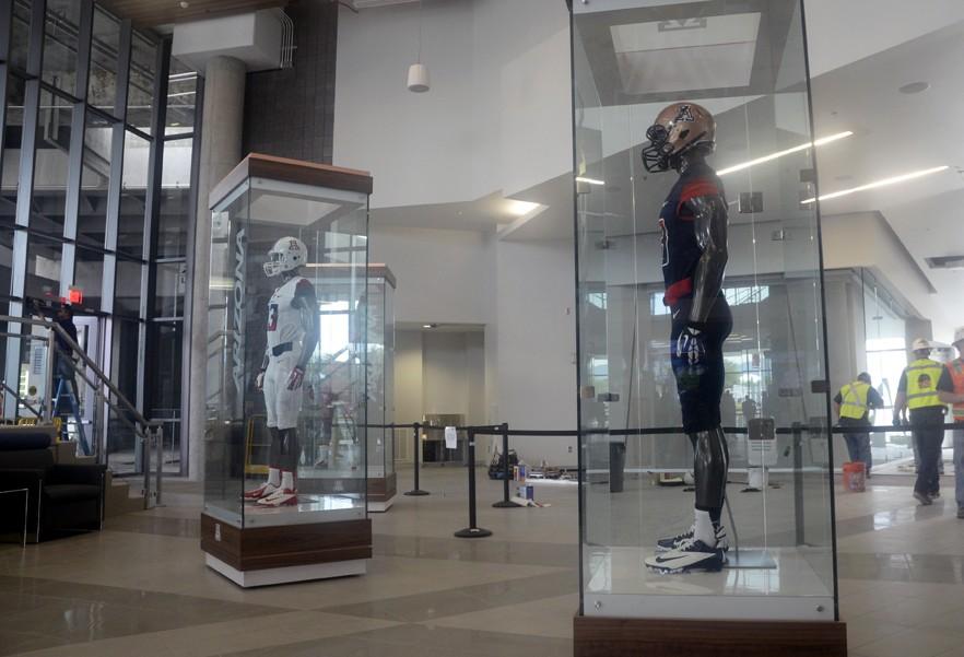 Ryan Revock/ Arizona Summer Wildcat

Different uniforms are on display inside the Lowells-Stevens Football Faciity onThursday, Aug. 1, 2013 during a tour given by Athletics Director Greg Byrne.