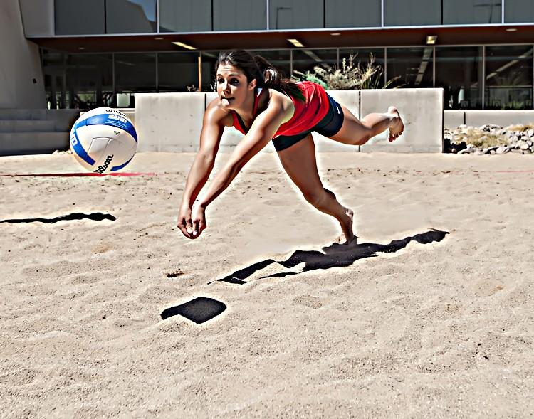 UA+ready+to+serve+up+sand+volleyball