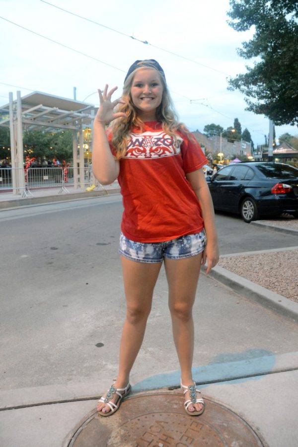 Ryan Revock /The Daily Wildcat

Tessa Patterson sports a Zona Zoo t-shirt Thursday. Game wear fashion is a quintessential part of football season. 
