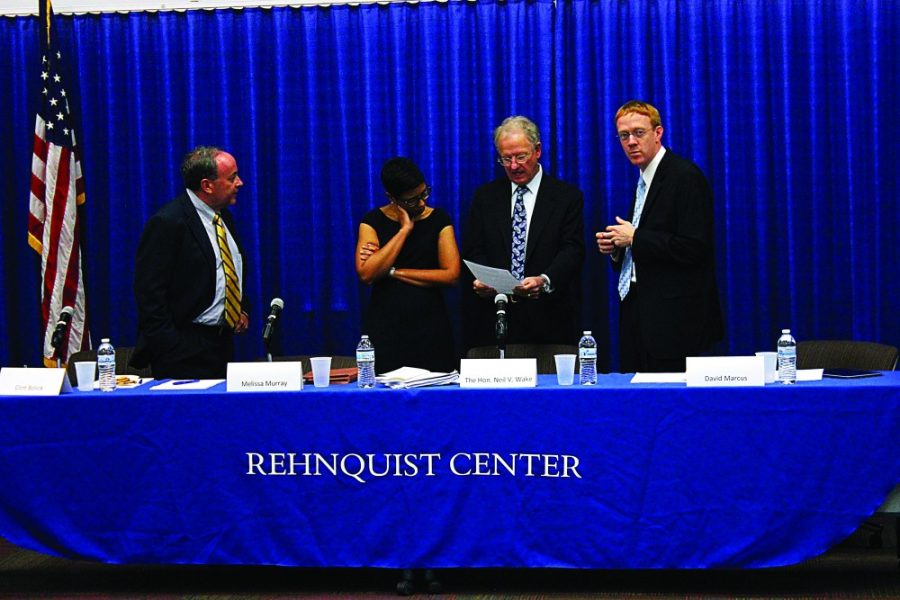 Rebecca Marie Sasnett/ Arizona Daily Wildcat

David Marcus, professor of law, U.S. District Judge Wake, Melissa Murray, professor of law at University of California, Berkley, and Clint Bolick, vice president for litigation for the Goldwater Institute, listen to their introductions before they take the stand to discuss a few supreme court cases at James E. Rogers College of Laws Annual Constitution Day Program Monday, Sept. 16, 2013. 