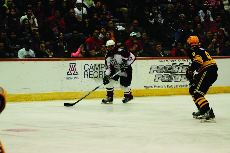 Tyler Baker  /  Arizona Daily Wildcat

Ansel Ivens-Anderson handles the puck against ASU on Saturday, Feb. 23, 2013. 