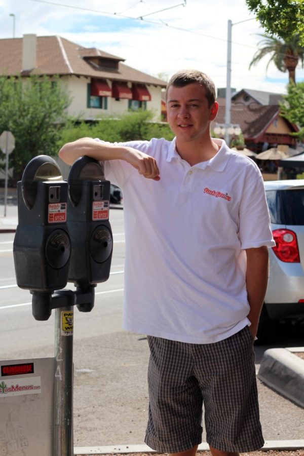 Amy Johnson /The Daily Wildcat

Thomas Maguire, founder of Park Genius, stands next to a parking meter on University Blvd. on Aug. 29th. Maguire created the app in an entrepreneurial class through the Eller College of Business. 