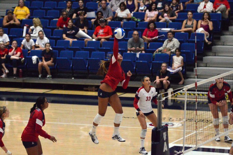 Brian Valencia/ Arizona Daily Wildcat

Jane Croson spikes the ball at the volleyball scrimmage on Saturday, Aug. 24, 2013. Croson is a junior at UA. 