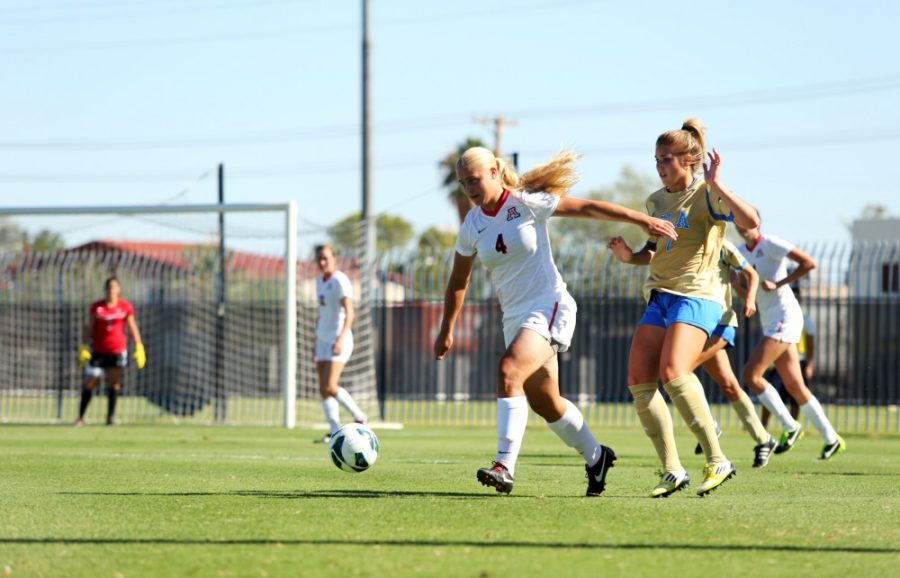 Keenan Turner/The Daily Wildcat

UA Forward, Justene Kesterson, escapes a UCLA defender on Sundays game against the Bruins. The Wildcats lost 2-1.