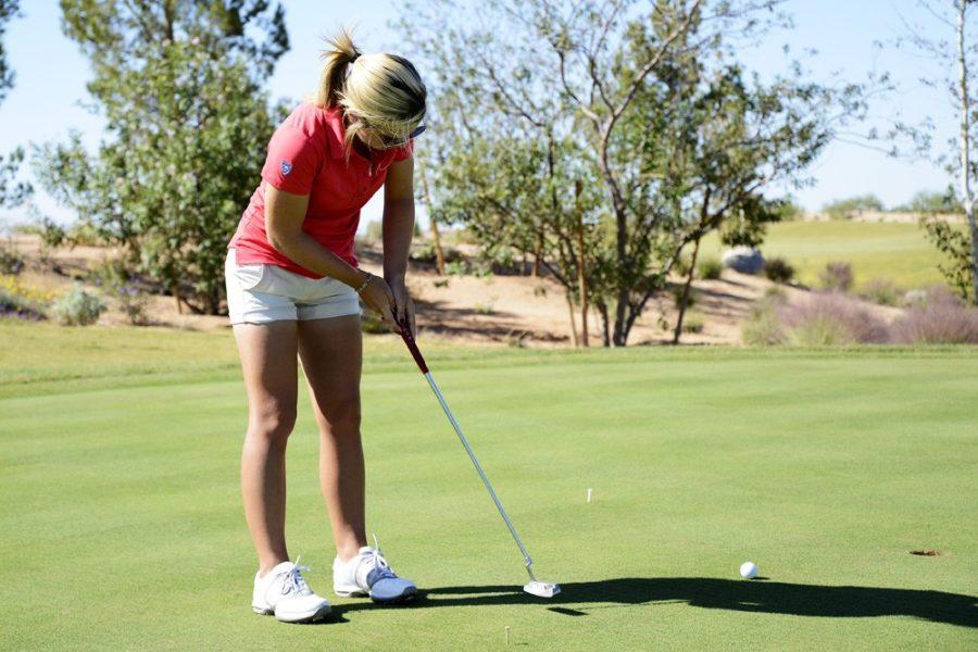 Ryan Revock/The Daily Wildcat

UA golfer, Lindsey Weaver practices putting at practice on Oct. 11 at the Casino Del Sol Sewailo Golf Club.  