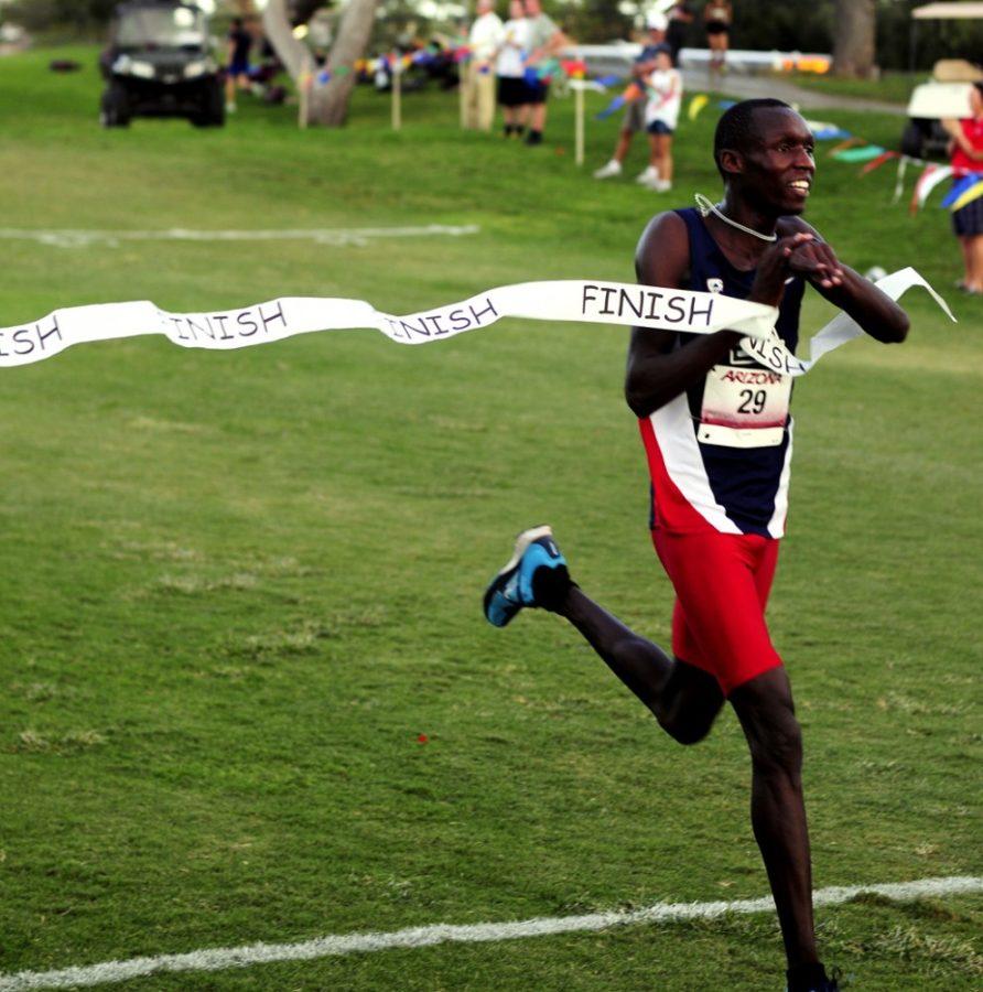 Tyler Baker / Arizona Daily Wildcat

Collins Kibet crosses the finish line at the Dave Murray Invitational ib Tucson on Sept. 20, 2013.