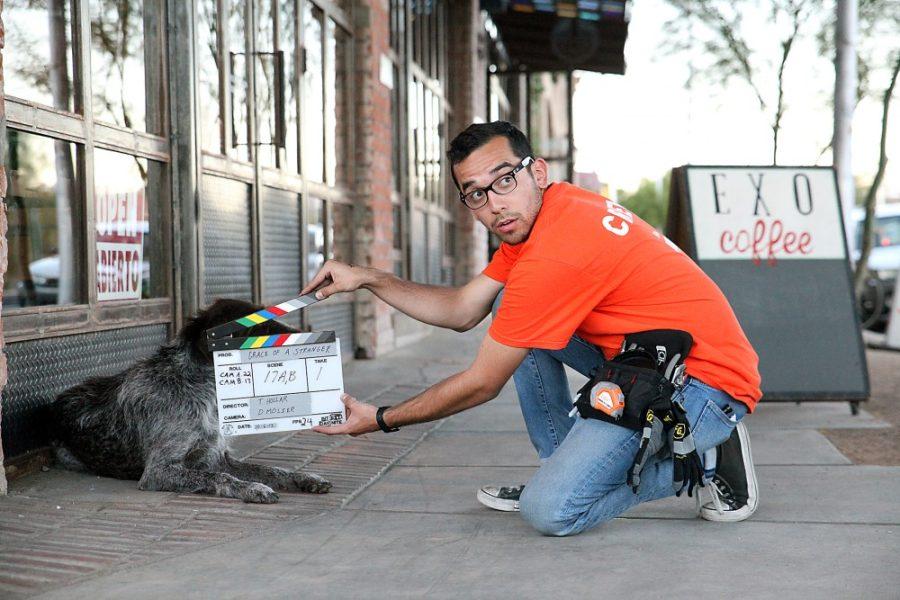 Shane Bekian / The Daily Wildcat

Junior film major, Dylan Kearney, prepares the slate for the 
