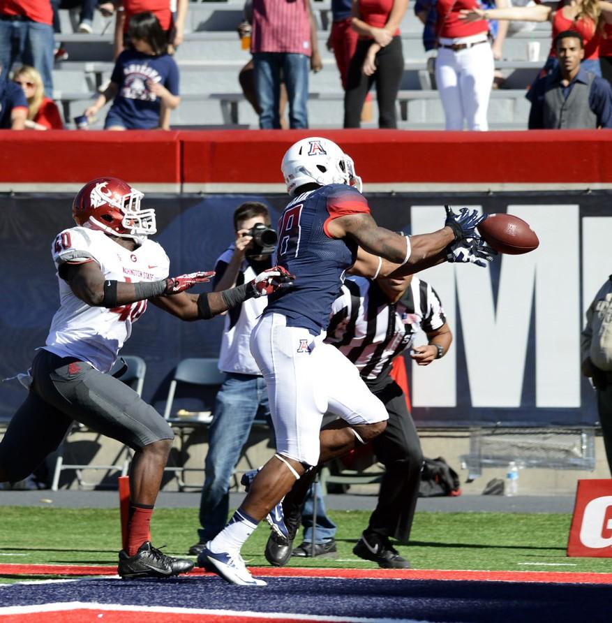 Ryan Revock / The Daily Wildcat

UA senior receiver Terrence Miller misses a pass in the endzone against Washington State on Saturday at Arizona Stadium.  
