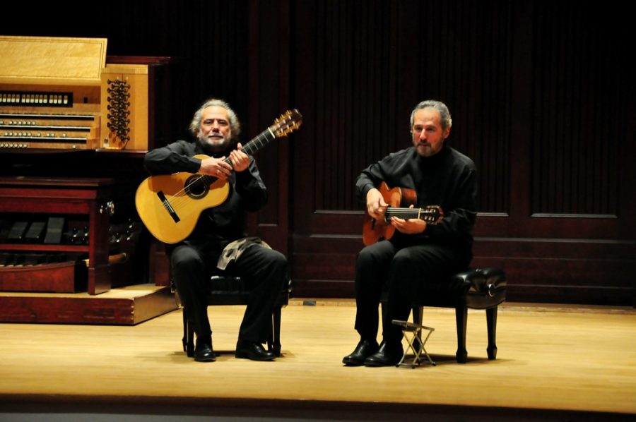 Lili Steffen / The Daily Wildcat

Sergio and Odair Assad perform during the International Guitar Festival at Holsclaw Hall, Saturday. Throughout the week the duo performed and taught students.
