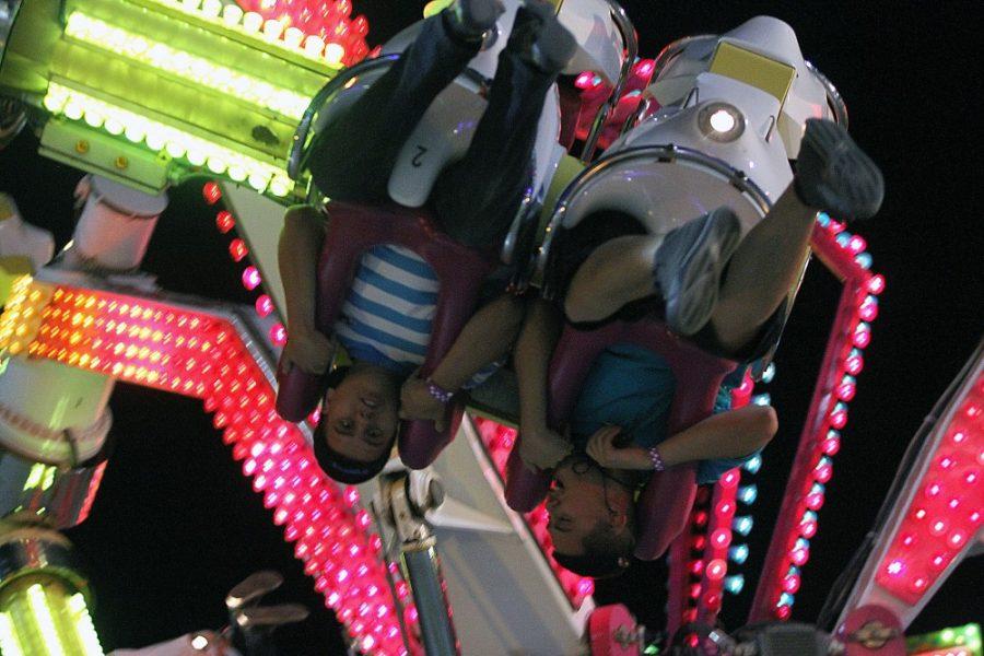 Kelsee Becker / Arizona Daily Wildcat

UA students, as well Tucson residents of all ages, enjoy the first night of Spring Fling on Thursday. The student run carnival features games, rides, and tasty treats every night through the weekend.