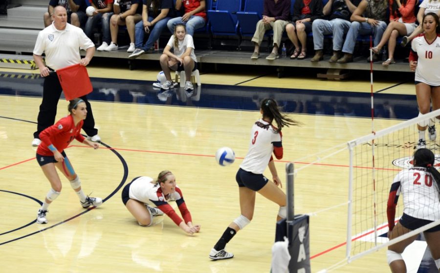 Ryan Revock / The Daily Wildcat

UA outside hitter Madi Kingdon dives for a dig against Oregon on Oct. 4 at the McKale Memorial Center.  