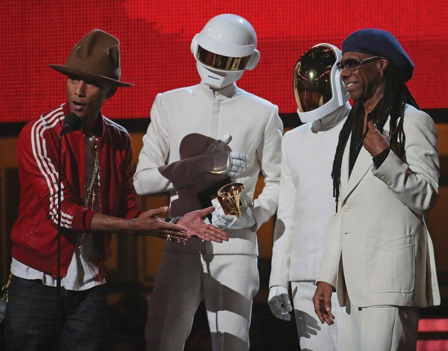 Photo Courtesy of McClatchy Tribune

Pharrell Williams, Daft Punk duo, and Nile Rogers accept their Grammy for Record of the Year at the 56th Annual Grammy Awards at Staples Center in Los Angeles on Sunday. 