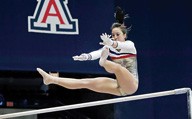 Courtesy of Arizona Athletics

UA sophomore all-around Shelby Edwards performs her routine on the parallel bars during the UA vs. Missouri Saturday, March 16, 2013.