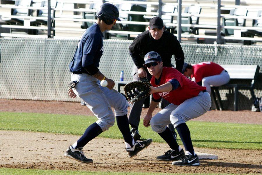 Cecilia Alvarez/ The Daily Wildcat

Freshman infielder Bobby Dalbec holds the runner on during an intrasquad scrimmage at Hi Corbett Field on Tuesday.