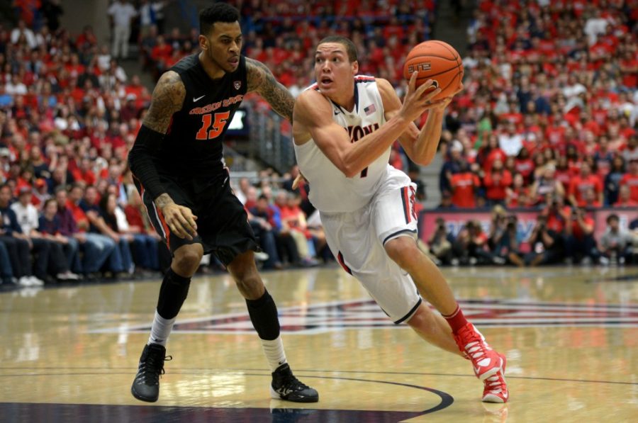 Tyler Baker /  The Daily Wildcat

Freshman forward Aaron Gordon moves around Oregon State junior forward Eric Moreland during the second half of Arizonas 54-76 win against Oregon State at McKale Center on Sunday.