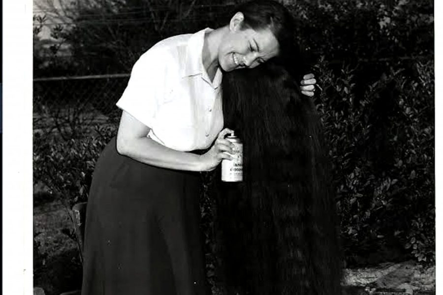 Courtesy of 
This is one of the photos from Stans Photos, a collection Arthur had of women whose hair was just really long, down to the ground long