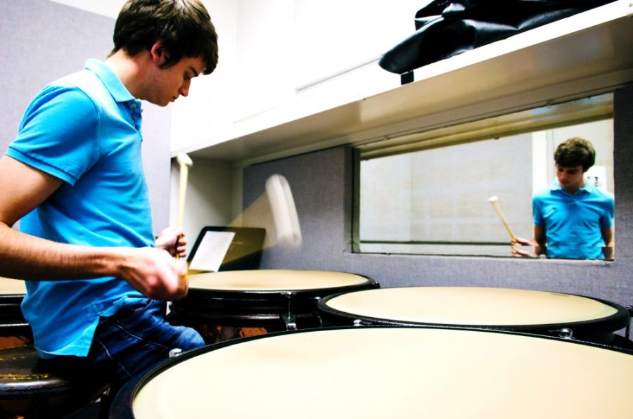 Steve Nguyen/ The Daily Wildcat
 
Trevor Barroero, a sophomore percussion performance major, plays timpani exercises in the percussions room at the UA School of Music. Trevors research focuses on studying Cleveland Style and a percussionists voice in their playing.