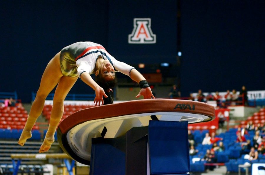 Rebecca+Noble%2F+The+Daily+Wildcat%0A%0ASophomore+all-around+Shelby+Edwards+performs+her+vault+routine+durng+Arizonas+196.250-197.500+loss+against+UCLA+in+McKale+on+Saturday.+Edwards+scored+a+9.85+on+her+vault+routine.