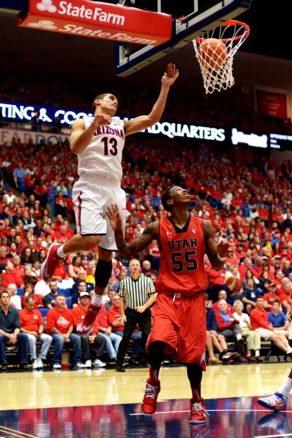 Tyler Baker / The Daily Wildcat

Junior Nick Johnson (13) jumps for a shot as Utah Junior Delon Wright (55) tries to guard Johnson during Arizonas 65-56 win on Jan. 26. The Arizona Wildcats will play the Runnin Utes today during their first Pac-12 game at the MGM Grand in Las Vegas, Nevada.
