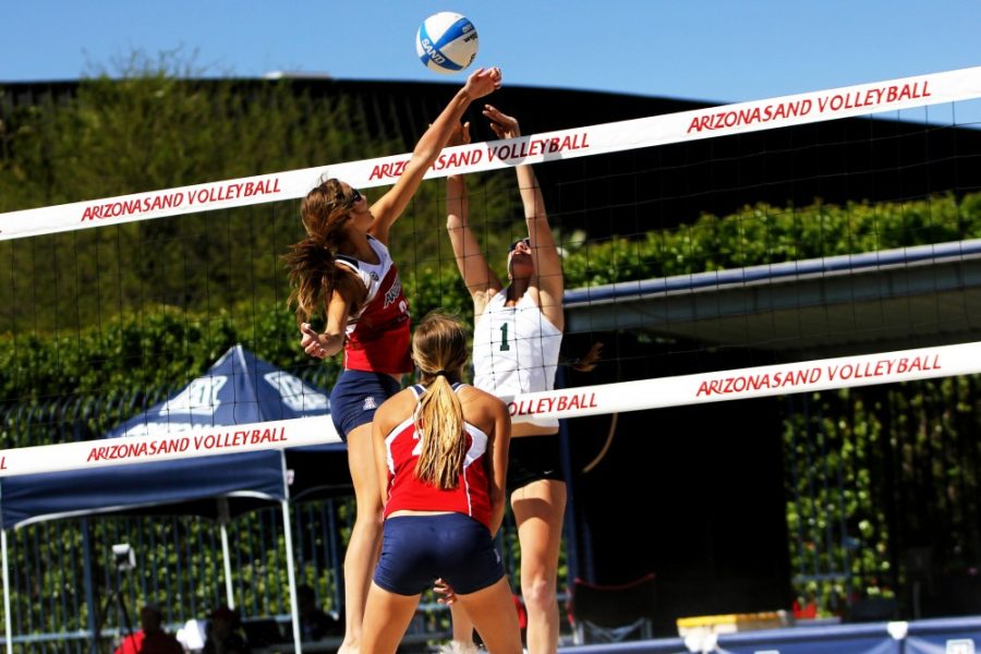 Savannah+Douglas+%2F+The+Daily+Wildcat%0A%0AMcKenna+%2821%29+and+Madison+Witt+%2823%29+compete+as+a+pair+during+the+UA+sand+volleyball+match+against+Tolson+University+on+Saturday%2C+Mar.+15+at+the+sand+volleyball+courts.+