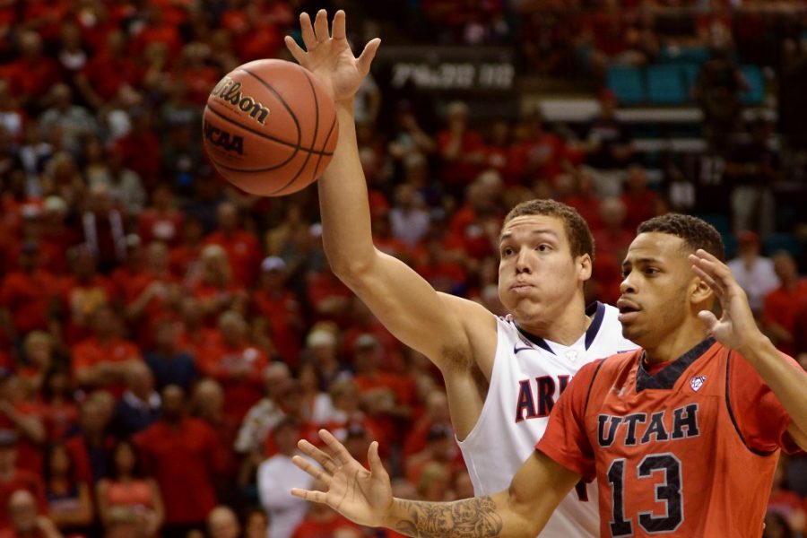 	Arizona freshman forward Aaron Gordon (11) reaches for the ball before it goes out of bounds during Arizona’s 71-39 victory over Utah in the quarterfinals of the Pac-12 Tournament at MGM Grand Garden Arena in Las Vegas. Arizona advances to the semifinals while Utah is out of the tournament. 