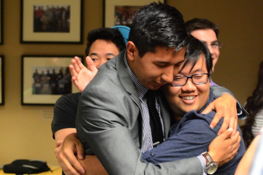 Steve Nguyen/ The Daily Wildcat

Issac Ortega has an emotional victory with close friends after being elected as ASUA student body president on Thursday night.
