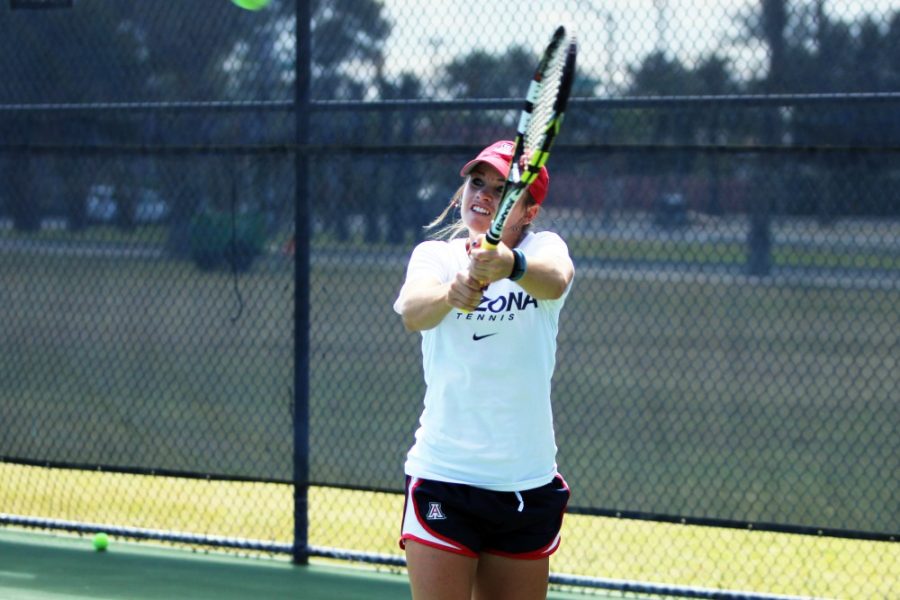 Rebecca Marie Sasnett/ The Daily Wildcat 

Senior Lacey Smyth (pictured) competed with partner Shayne Austin during the womens tennis match during the 5-2 sweep against Colorado on Saturday. 