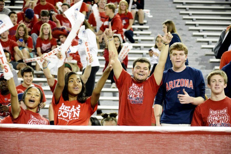 	File Photo/The Daily Wildcat 

	UA students cheer during a home football game. The UA will host a screening of “Remember the Titans” on Thursday night at Arizona Stadium to begin “Super Wildcat Weekend.”