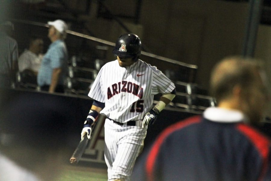Arizona junior outfielder Joseph Maggi walks toward the dugout after being the last batter struck out during the 10th inning of Arizonas 8-0 loss against UCLA at Hi Corbett Field on Friday evening. Arizona is set to play UCLA on Saturday and Sunday.