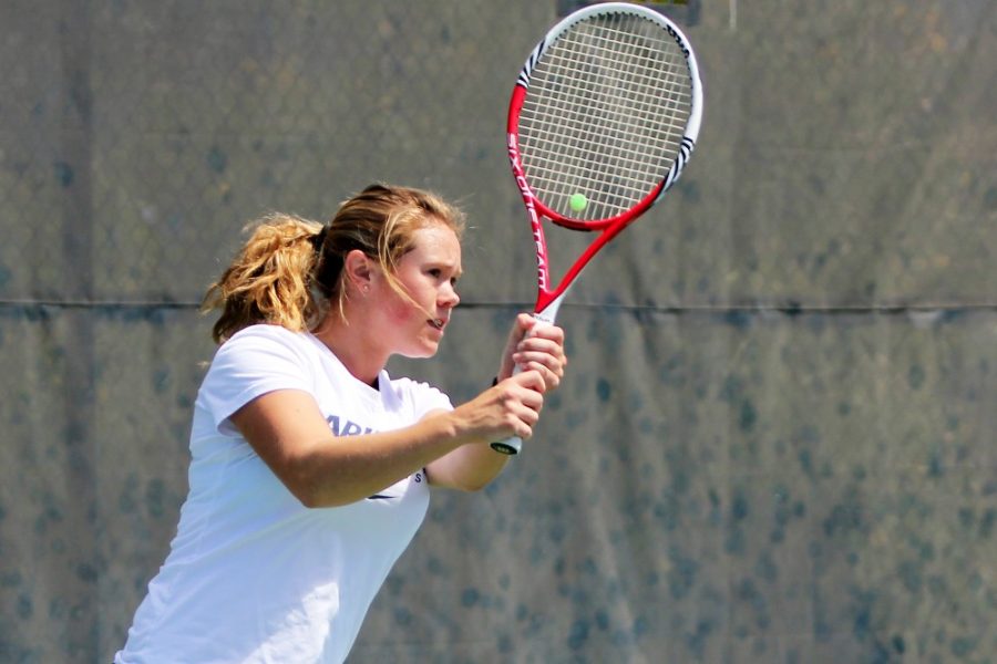 	Senior Susan Mc Rann warms up before Arizona’s 5-2 win against Colorado at the LaNelle Robson Tennis Center on April 5. Mc Rann has competed in the national championships twice with the UA team.