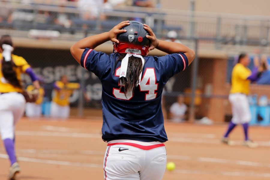 %09Arizona+third+baseman+Katiyana+Mauga+reacts+to+being+tagged+out+at+first+base+during+Arizona%26%238217%3Bs+5-1+loss+against+LSU+in+the+NCAA+tucson+regional+at+Hillenbrand+Stadium+on+Sunday.The+Wildcats+finished+the+season+44-16.+