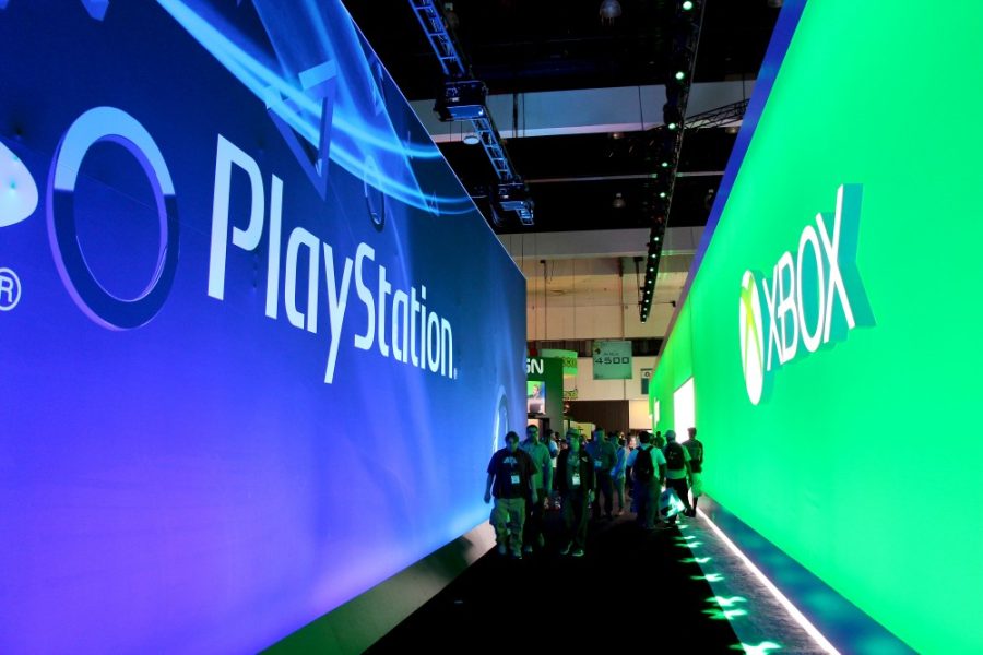 	Courtesy of Torsten Ward

	Sony and Microsoft’s convention floor boothes compete for attention at the 2013 Electronic Entertainment Expo in Los Angeles, California. Fans at the 2014 Expo experienced newly announced titles for the PS3, PS4, PSVista, Xbox 360 and XboxOne.