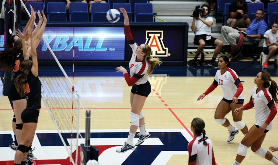 	File photo

	Madi Kingdon (9) spikes the ball during UA’s 3-1 win against Oregon State in McKale Center on October 6, 2013. Kingdon is the returning team leader in several major statistical categories. 