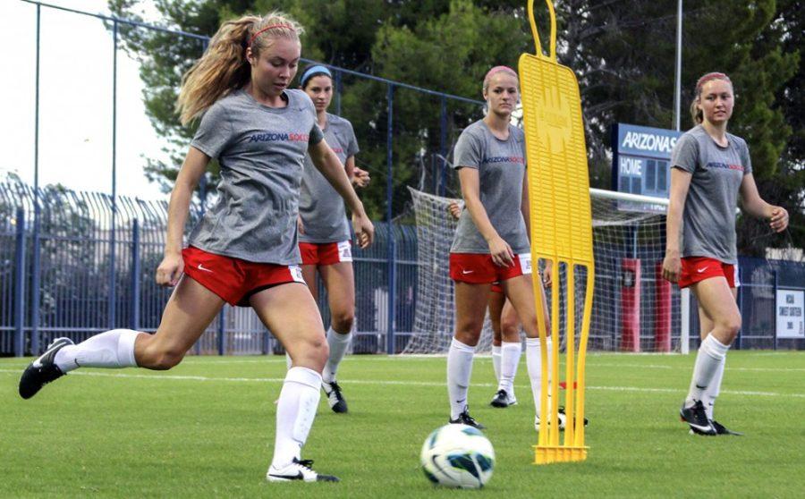 	<p>Members of the Arizona soccer team practice on Thursday. The Wildcats take the field for an exhibition on Aug. 16 against New Mexico. </p>